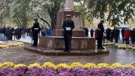Torontonians gather in the snow to mark Remembrance Day