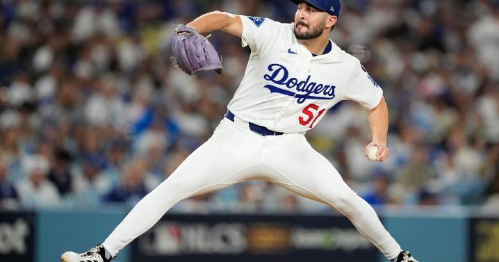 Amid World Series, Blue Jays relievers join Dodgers in wearing tribute to absent Los Angeles pitcher Vesia