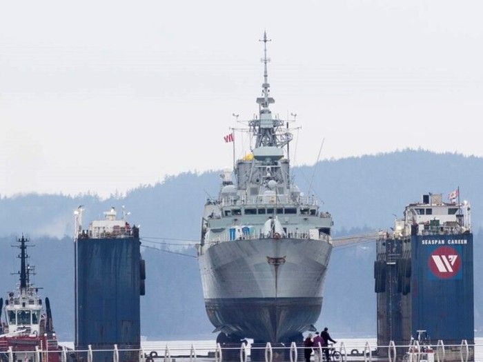 Massive floating dry dock moves HMCS Vancouver to Esquimalt for inspection