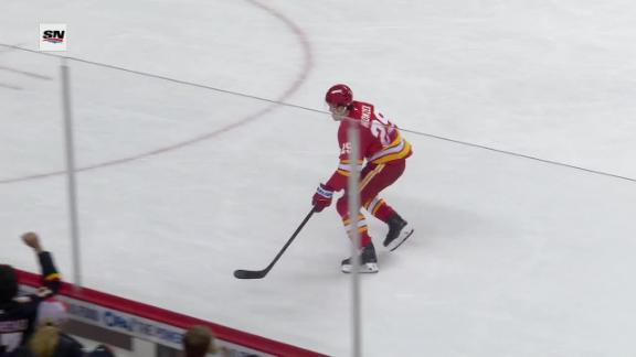 Wolf makes 16 saves for his 1st shutout of the season in Flames' 2