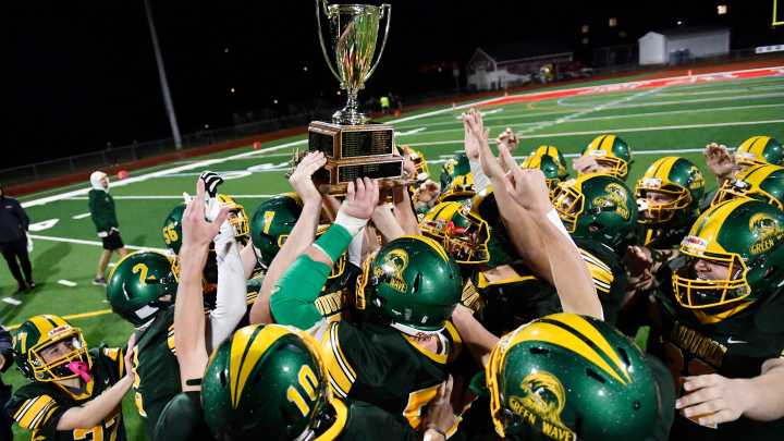 Audubon football brings home the hardware after Thanksgiving Eve win
