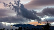 Heavy rain subsides as the sun sets across the Coachella Valley