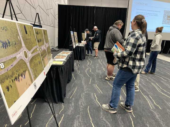 Public input meeting gives pros and cons for possible interchange designs at Highway 2 intersection