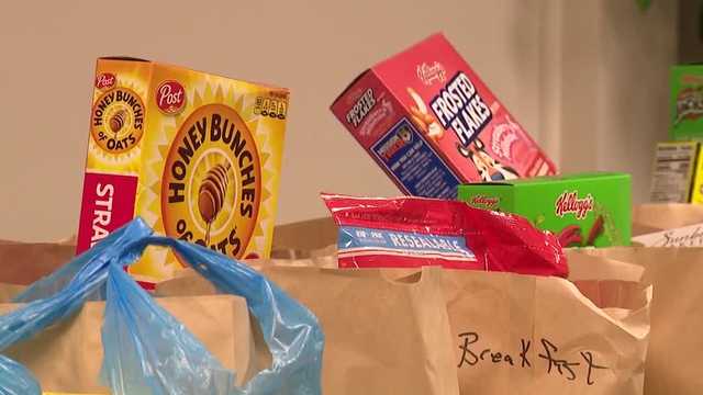 'All here to help': Charlestown church collects food donations amid aid uncertainty