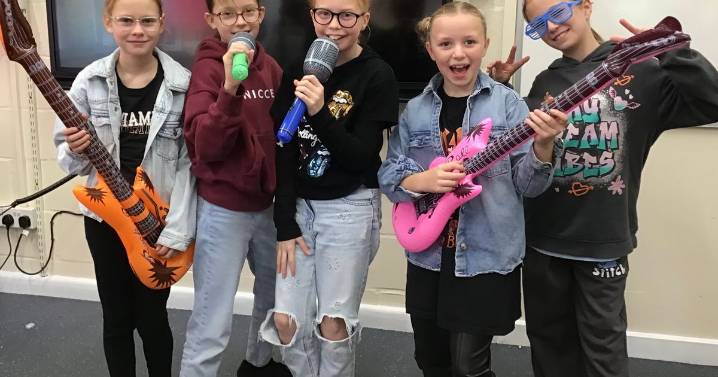 Pupils go full rock star to launch new maths game at Tiverton school