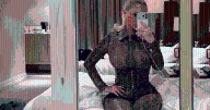 Alabama Barker's Sheer Catsuit Photos Deliver a Red 'Hottt' Thong Reveal