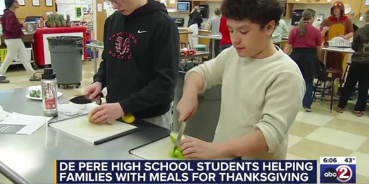 De Pere High School students cook Thanksgiving meals for families in need