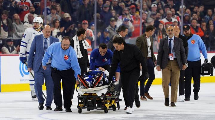 Maple Leafs' Chris Tanev stretchered off after collision