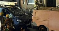Firefighters rush to blaze at Glasgow flat as road closed