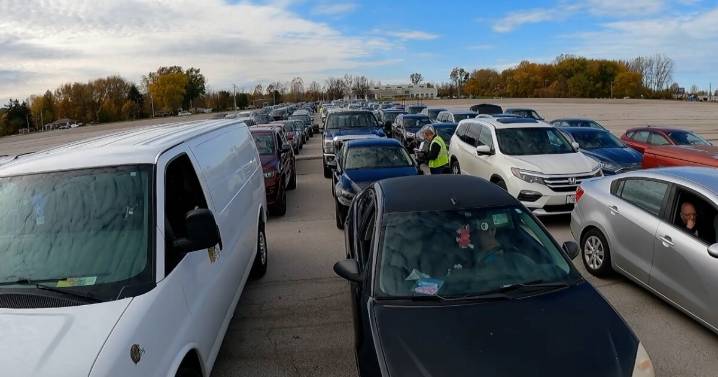 Hundreds of cars lined up for hours ahead of an emergency drive
