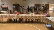 Church volunteers teach Adams Elementary students table manners