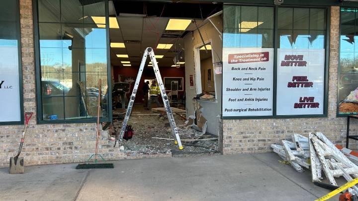 Car crashes into business in Plymouth shopping plaza
