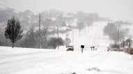 A major winter storm disrupts travel as millions head home after Thanksgiving
