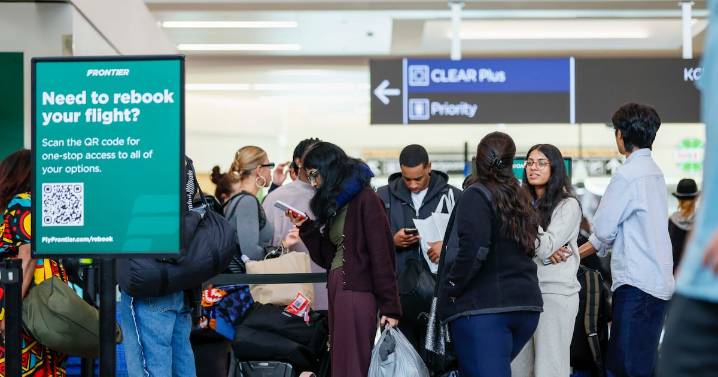Travelers navigate chaos, confusion at Atlanta airport