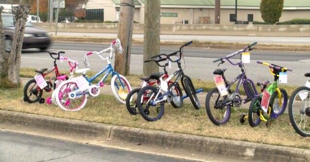 Radio host Mojo braves heights in Huntsville for Bikes or Bust fundraiser