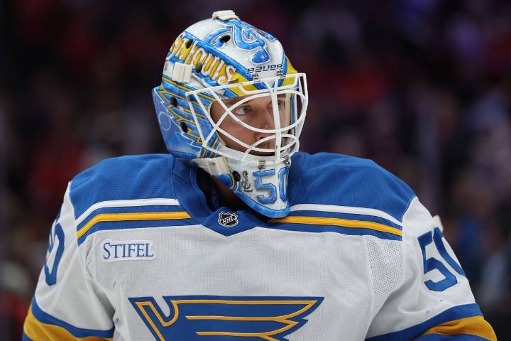 Blues' Jordan Binnington tries to hide Alex Ovechkin's 900th goal puck in his pants