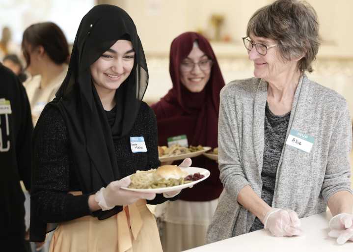 Grand Forks area churches spread holiday cheer by serving traditional Thanksgiving dinners