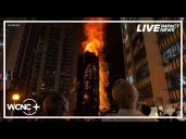 Crews work to put out massive fire at Hong Kong high-rise building, 13 people killed