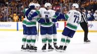 Canucks recover in OT against Predators after blowing 2