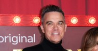 Robbie Williams makes rare red carpet appearance with daughter Teddy