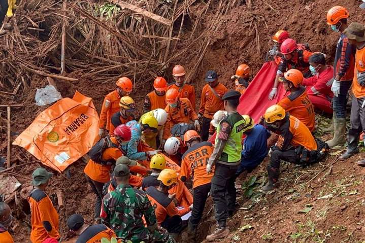More bodies found after Indonesia landslides, raising toll to 23 with 28 missing