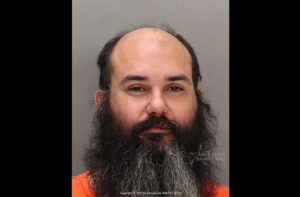 Man arrested after telling 911 he killed friend in assisted suicide at Idaho hotel