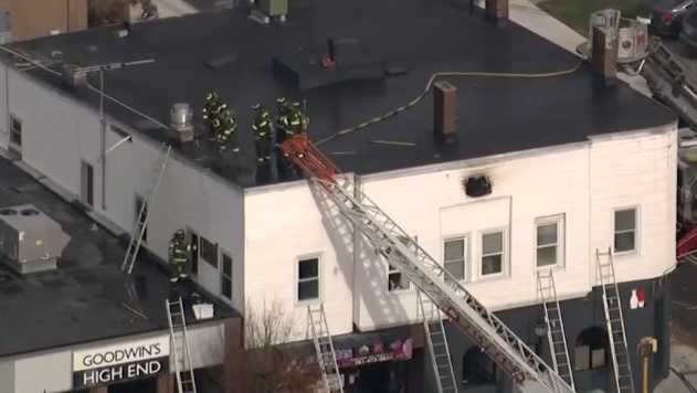 Crews battle 2-alarm fire in mixed-use building in downtown Waltham