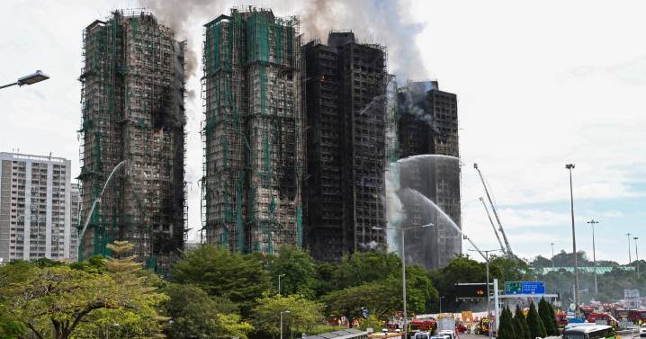 At least 44 killed in Hong Kong high-rise fire, hundreds still missing