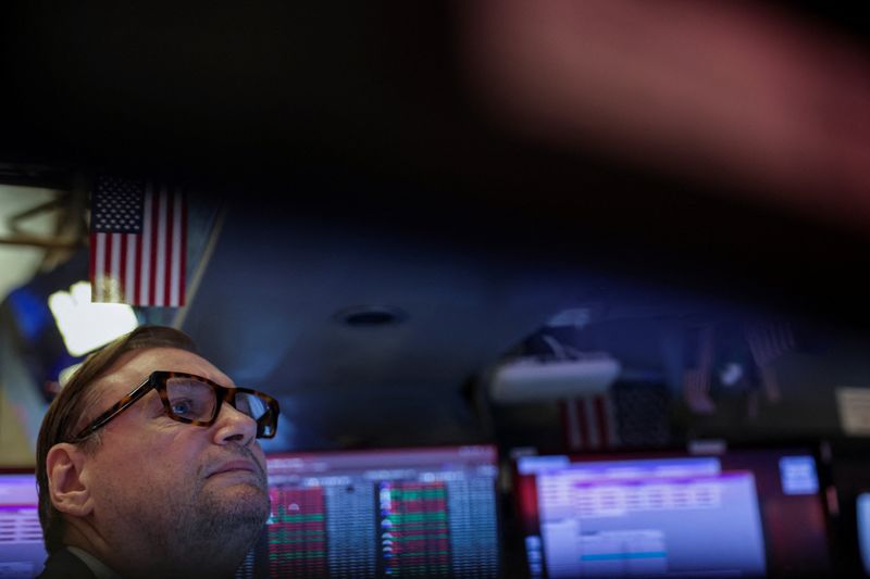 Wall St opens lower as valuation concerns, rate