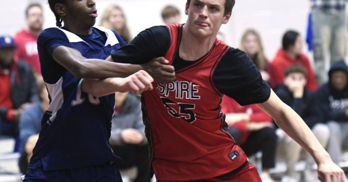 SPIRE's men's national scholastic basketball team rolls in opener