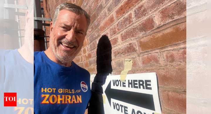 Former NYC mayor Bill de Blasio votes for Mamdani wearing viral ‘Hot Girls for Zohran’ T