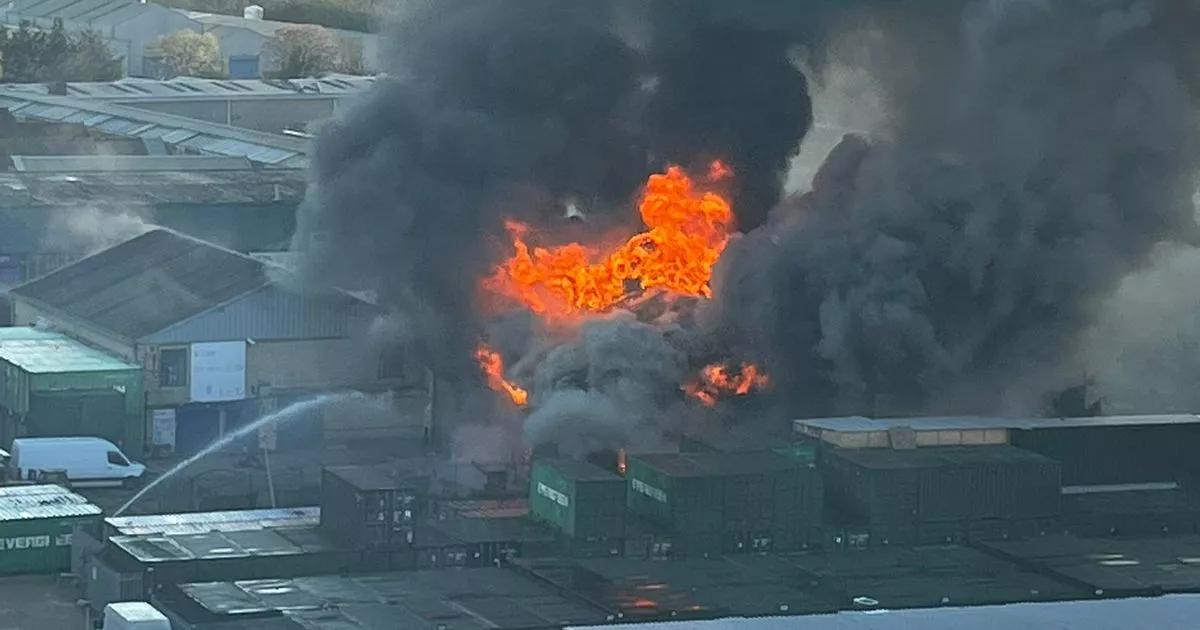 Southall fire live as 100 firefighters tackle huge warehouse blaze with explosions heard