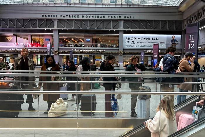Burned by flight delays, many of NYC's Thanksgiving travelers turn to trains