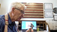 WWII Vet Ronold Ray celebrates 100th birthday with music and memories