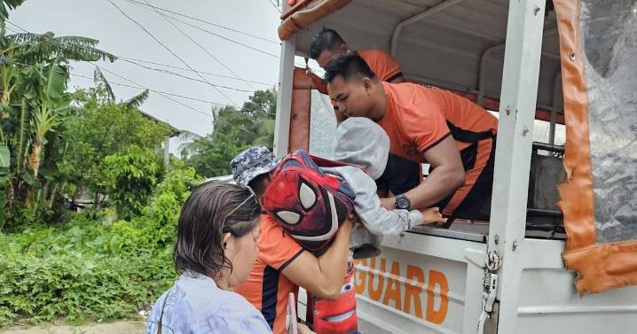 Tens of thousands of people evacuate to safety as typhoon approaches eastern Philippines