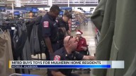 Mobile firefighters shop for Christmas presents