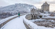 Photos show snow on Scottish castle as hardy local dons kilt for winter walk