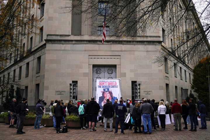 Judge says he’ll approve opioid settlement with OxyContin maker Purdue and Sackler family