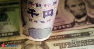 Yen on defensive, dollar firms as traders dial back Fed rate cut bets
