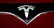 Tesla design flaws caused fiery crash that killed woman, severely injured husband, lawsuit alleges