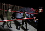 Israel extends arrest of military's former top legal officer, source says