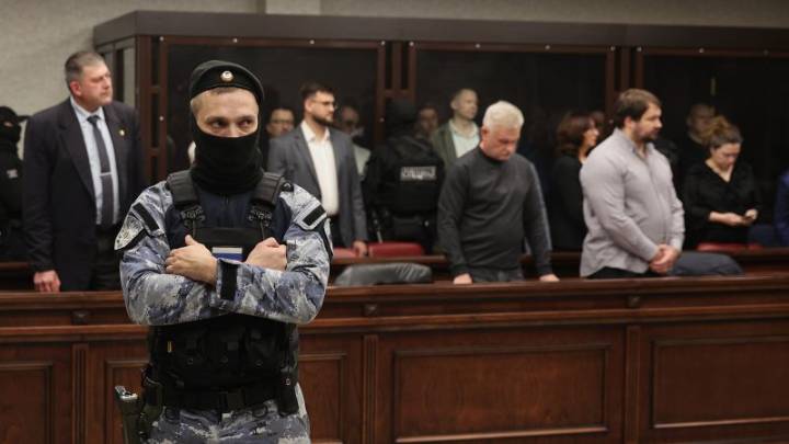 Russia hands life sentences to 8 people convicted for attack on key bridge to Crimea