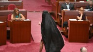Australian Sen. Pauline Hanson suspended from Parliament for wearing burqa in protest