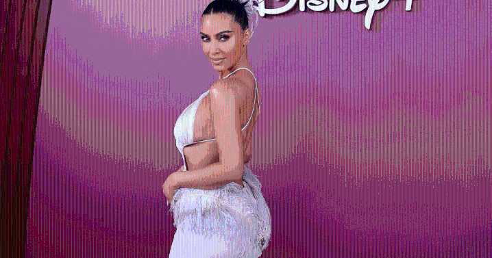 Kim Kardashian's Backless Gown Is Hanging on One String