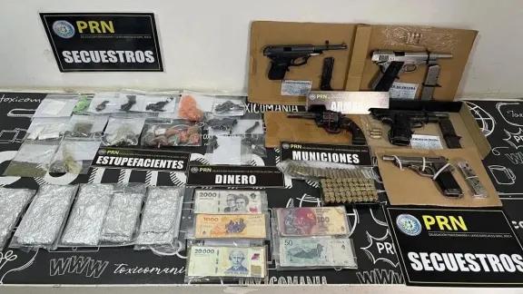 Desarticulan en Roca una banda con armas oficiales y 13 implicados tras diez allanamientos