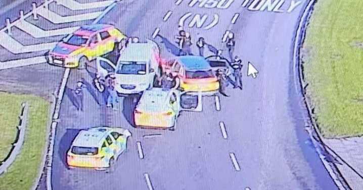Police chase armed man down motorway in high