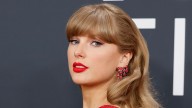 Taylor Swift perfects the art of wearing sheer lace tights with knee