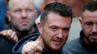 Tommy Robinson cleared of terror offence after refusing to give police phone PIN