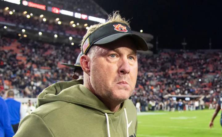 Why was Hugh Freeze fired by Auburn midway through the 2025 NCAA season?