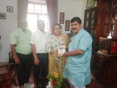 Reshel Bretny Fernandes presents her latest book to MLA Vedavyasa Kamath